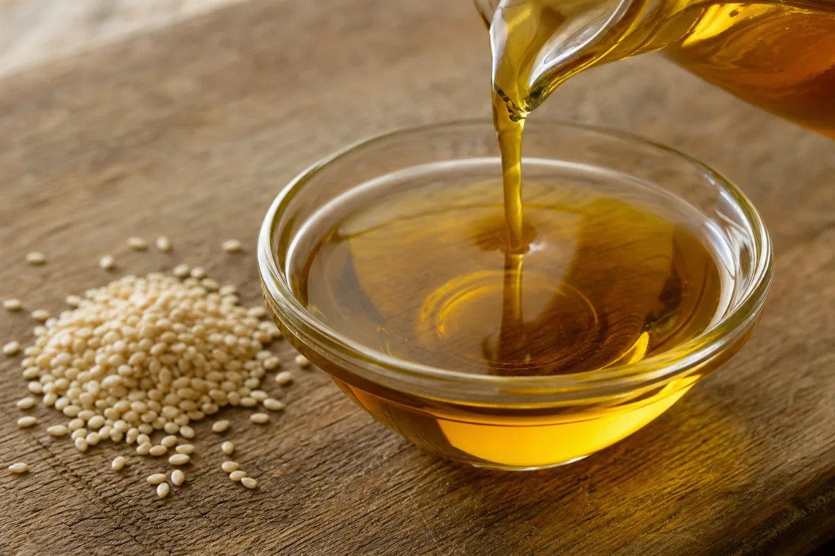 Close-up of sesame oil on skin and hair